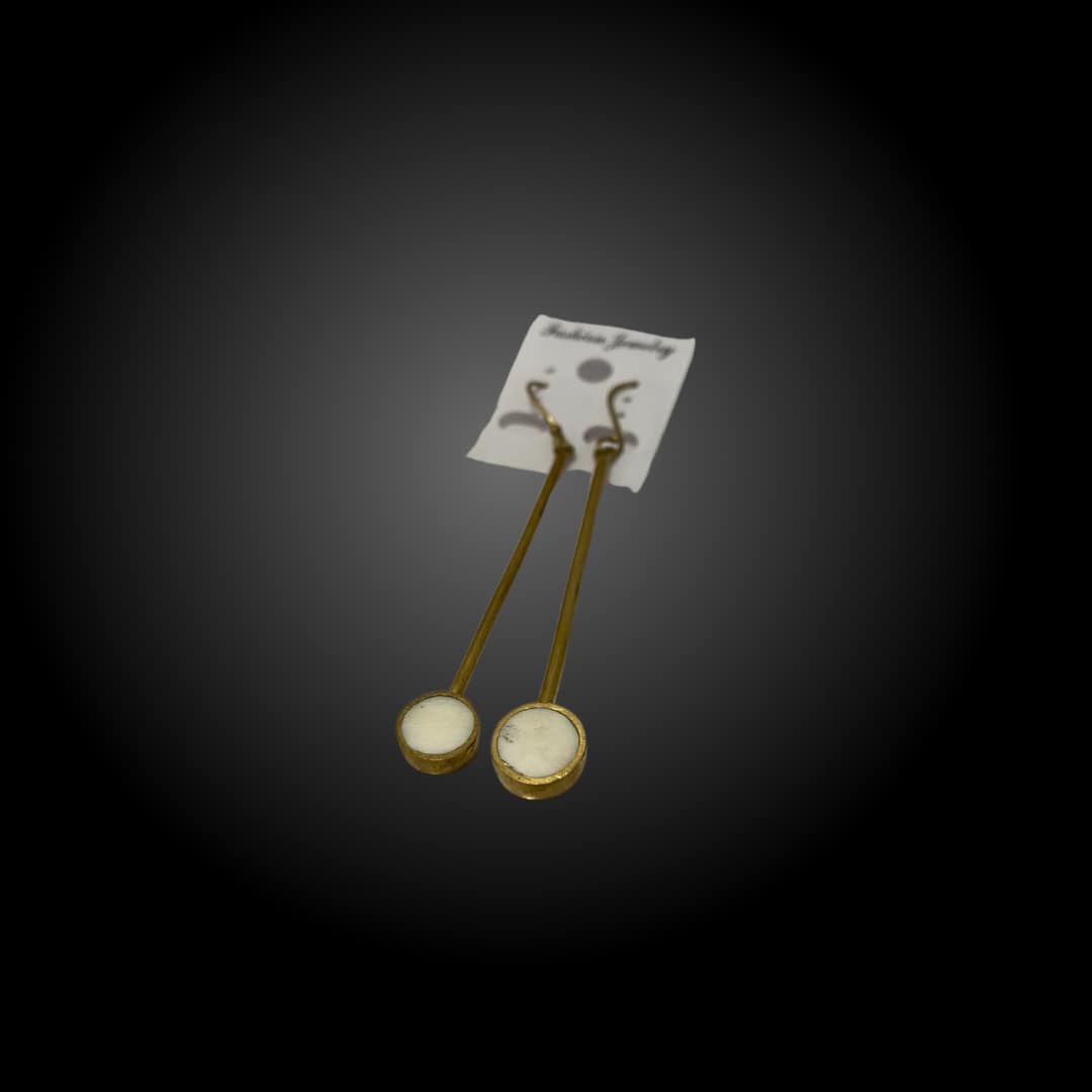 Ensemble boucle d'oreilles et bracelet blanc