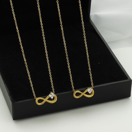 Pendentif signe de l'infini avec diamant doré